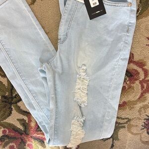 Fashion Nova Light Blue Ripped Skinny Jeans